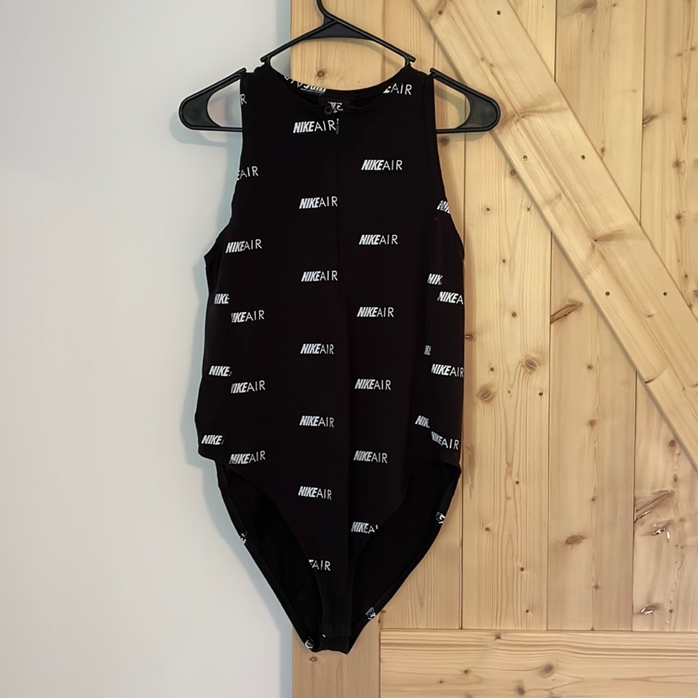 Black NIKE AIR womens bodysuit brand new never worn size L zip front